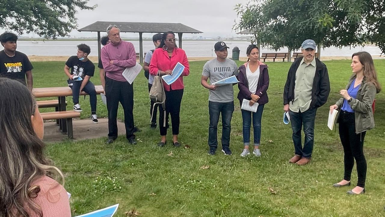 Catherine McCandless talking with Boston residents over the summer about potential climate adaptation s