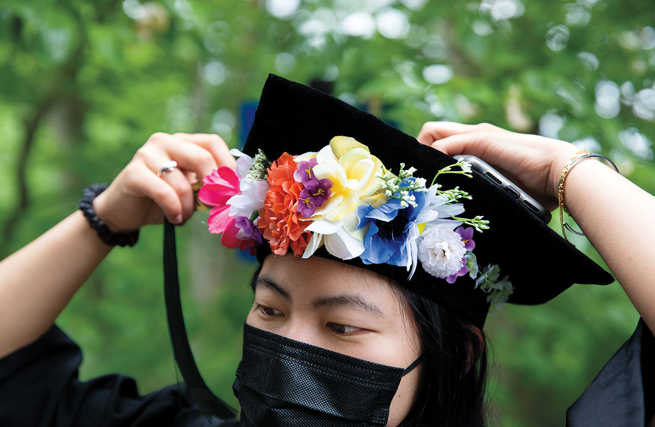 Lucille Tsao ’21 adjusts the tassel on her tam before the ceremony.