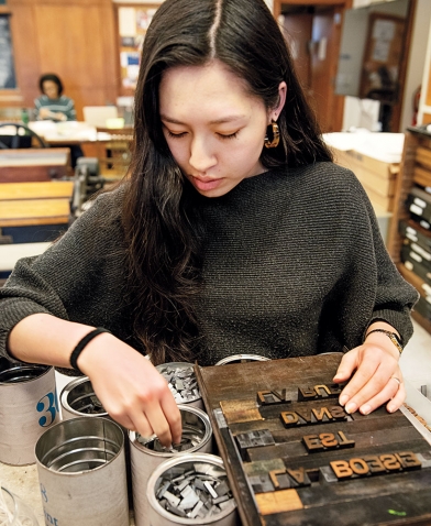 A student sets type