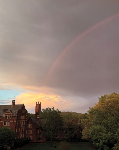 A photo shows a gorgeous rainbow arching above campus.