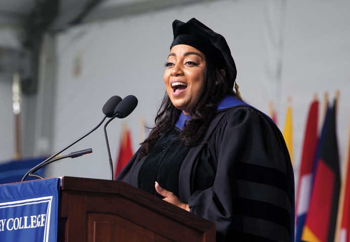 A photo of Massachusetts State Rep. Liz Miranda ’02 delivering her commencement address