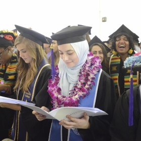 Members of the class 0f 2018 read their programs at Commencement.