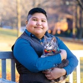 A photo of AJ Guerrero and her cat