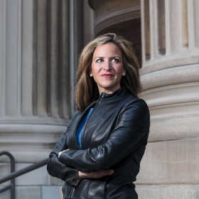 Jocelyn Benson '99 wearing a leather jacket