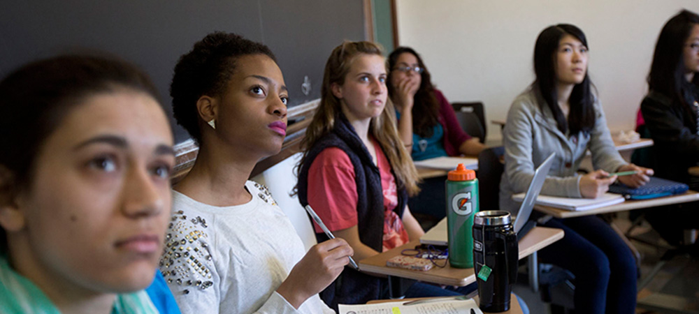 Students look captivated by a teacher's lecture